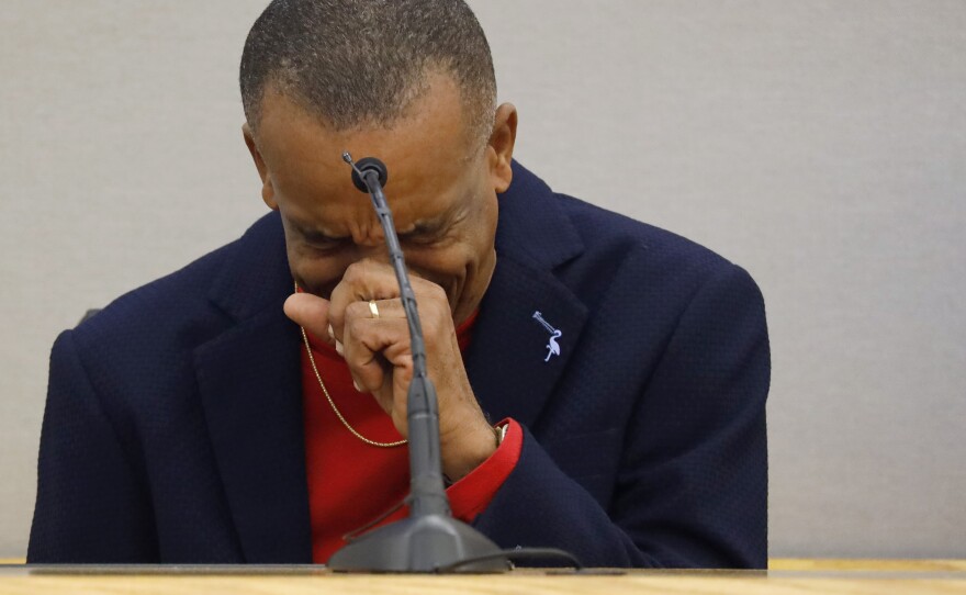 Bertrum Jean, father of Botham Jean, breaks down on the witness stand while talking about his son during the punishment phase of the trial of former Dallas police officer Amber Guyger.