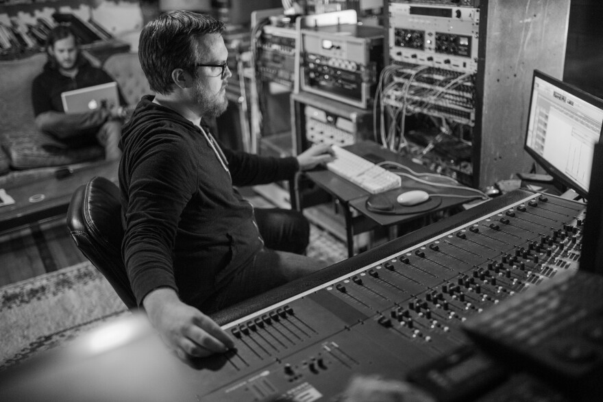 Ben Majchrzak is seen at work behind the console at Native Sound recording studio in St. Louis. Majchrzak started an ad hoc grant program to funnel cash payments to musicians who are out of work because of coronavirus concerns.  [3/18/20]