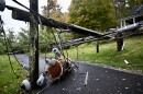 Power lines and tree branches cover a sidewalk in Mansfield, Connecticut. during a nor’easter on Sept. 27, 2026.