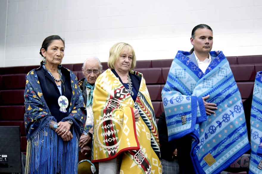 Secretary of the Interior Deb Haaland stands alongside Montana Lt. Gov. Kristen Juras and Assistant Secretary for Indian Affairs Bryan Newland at the Confederated Salish and Kootenai Tribes celebration of the Bison Range restoration, May 21, 2022.