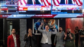 From left, Paul Manni, Sam Alasri, Wasel Yousaf, Waseem Makani and Abrahim Tamimi, cheer as Republican presidential nominee former President Donald Trump's speech is broadcast during an Arab Americans for Trump watch party at the Lava Java Cafe, a hookah lounge, in the early hours of Wednesday, Nov. 6, 2024, in Dearborn, Mich.