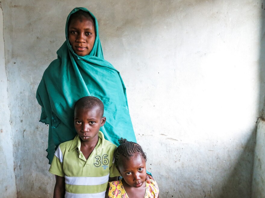 Aissatou Sanogo with two of her three children, Issa, 7, and Binetou, 3. Her 2-year-old was asleep when the picture was taken. Their father drowned in the Mediterranean while trying to reach Europe, hoping to earn a good living there to support his family in Senegal.