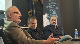 Hibbing Mayor Pete Hyduke, left, Rock Ridge Superintendent Noel Schmidt, center, and St. Louis County Commissioner Mike Jugovich, right, spoke on a panel April 22, 2026, at a meeting in Chisholm about the budget impacts of a downturn in mine production.