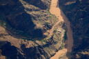 Bright Angel Canyon, damaged by flash floods, runs into the Colorado River in the Grand Canyon, Monday, Aug. 31, 2026, at Grand Canyon National Park, Ariz.