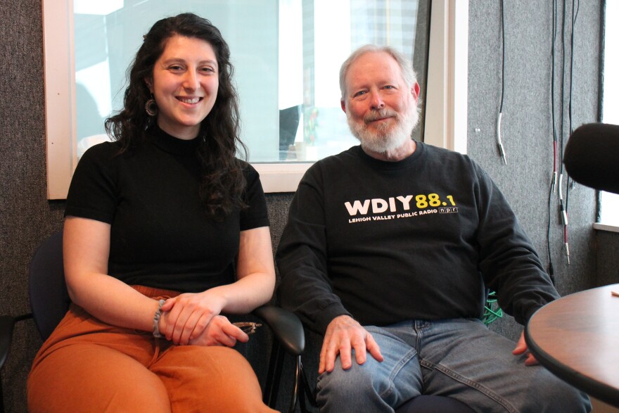  ArtsQuest programming specialist Addyson Young (left) and WDIY's Celtic Faire host Rick Weaver (right) discuss the upcoming Sláinte Festival.