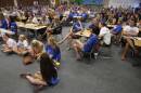 This 2015 file photo shows the crowd of people who attended the Freeburg High School Board of Education meeting to express support for the “Midgets” as the Little People of America asked the district to change the mascot.