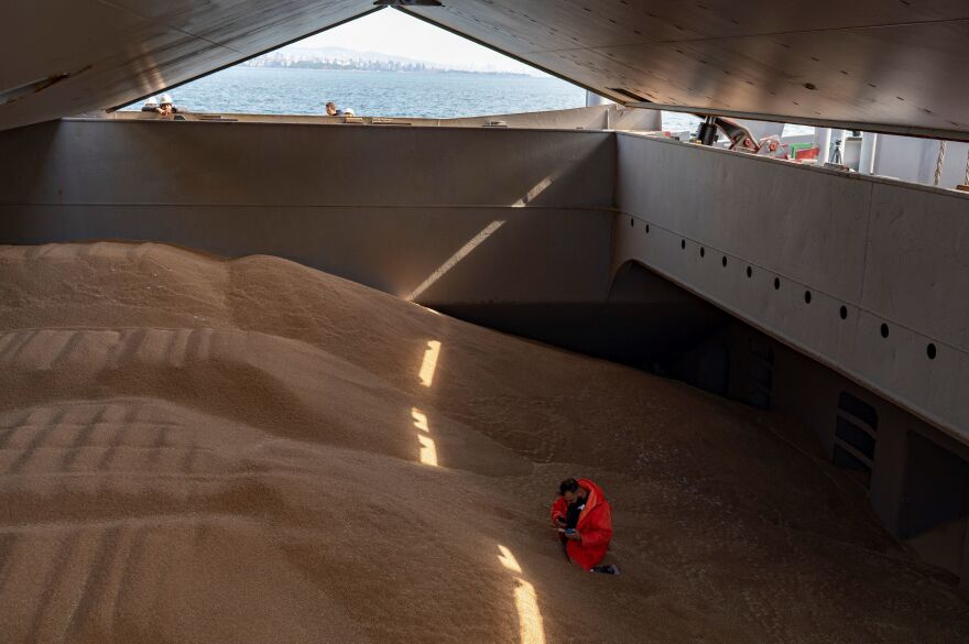 A crew member prepares a grain analysis for inspection by members of the Joint Coordination Center onboard the Barbados-flagged ship Nord Vind, coming from Ukraine, loaded with grain and anchored in Istanbul, on Oct. 11.