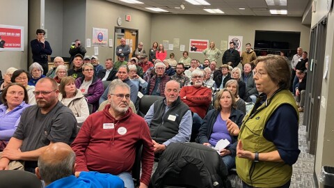 Maria Bribriesco, member of the Scott County Board of Supervisors, speaks to the public at Wednesday night's meeting at Scott County Library in Eldridge.