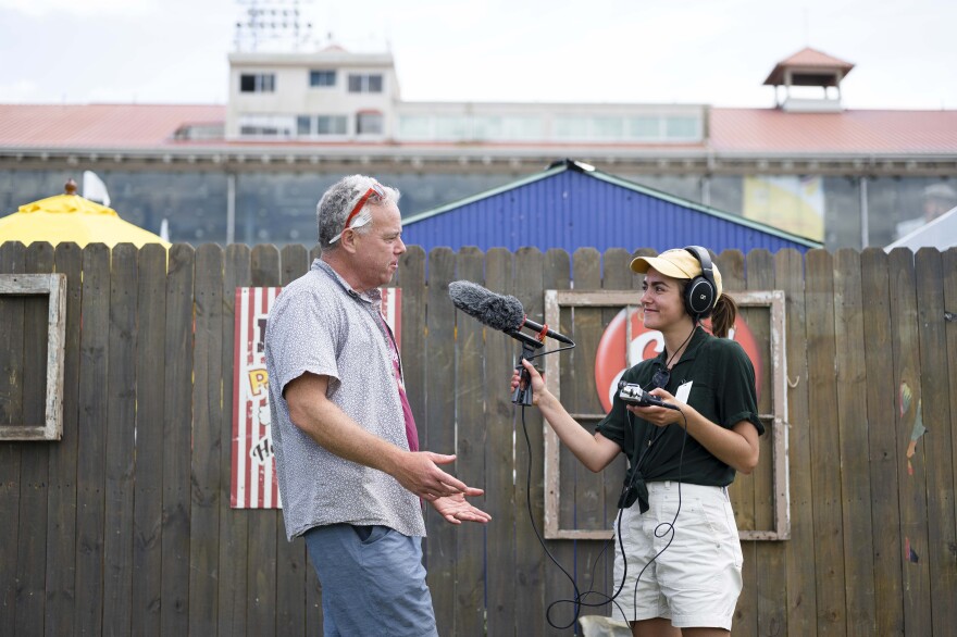 WWNO metro reporter Carly Berlin interviews Ian McNulty, a restaurant and food culture writer for the Times-Picayune and NOLA.com, on the first day of the New Orleans Jazz and Heritage Festival on April 29, 2022.