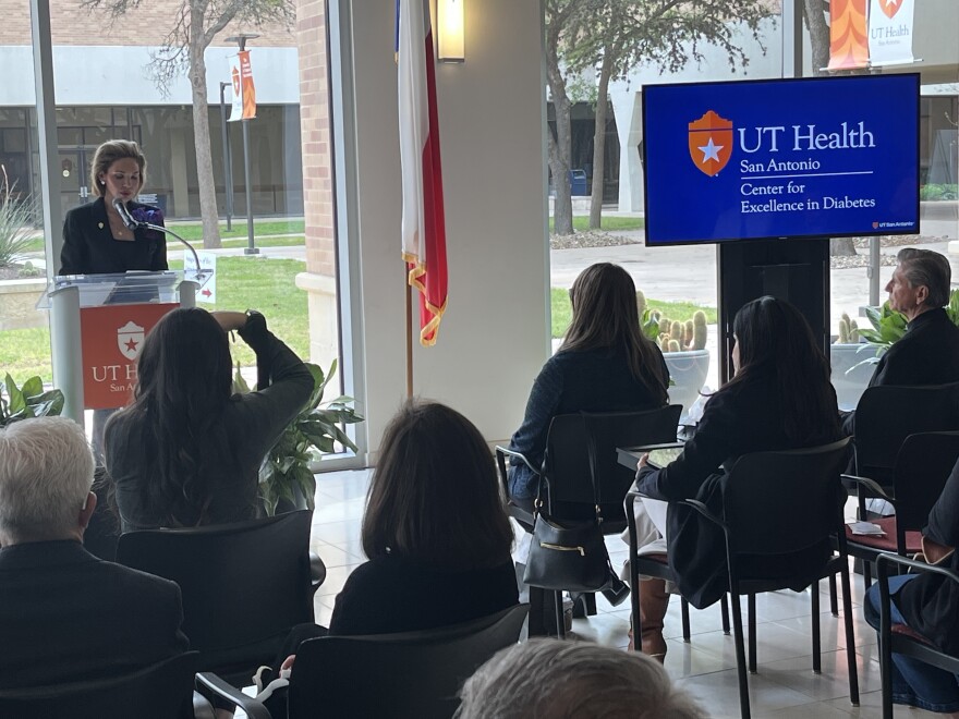 Dr. Carolina Solis-Herrera, the center’s founding director, speaks at Monday's launch.