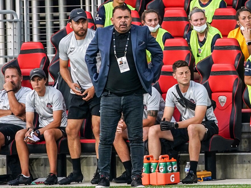 Coach Richie Burke of the Washington Spirit watches the play during a game against the North Carolina Courage at Audi Field on July 10, 2021 in Washington, DC.