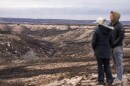 Landowners Abby Burkham-Breeding, left and her husband Austin Breeding, look over a portion of the 2,000 acres that was burned on their property by the Smokehouse Creek Fire on Thursday, Feb 29, 2024, in Roberts Country, Texas.