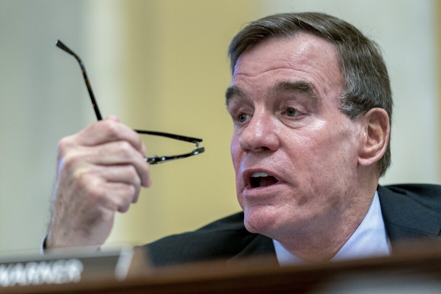 Sen. Mark Warner, D-Va., speaks during a Congressional hearing.