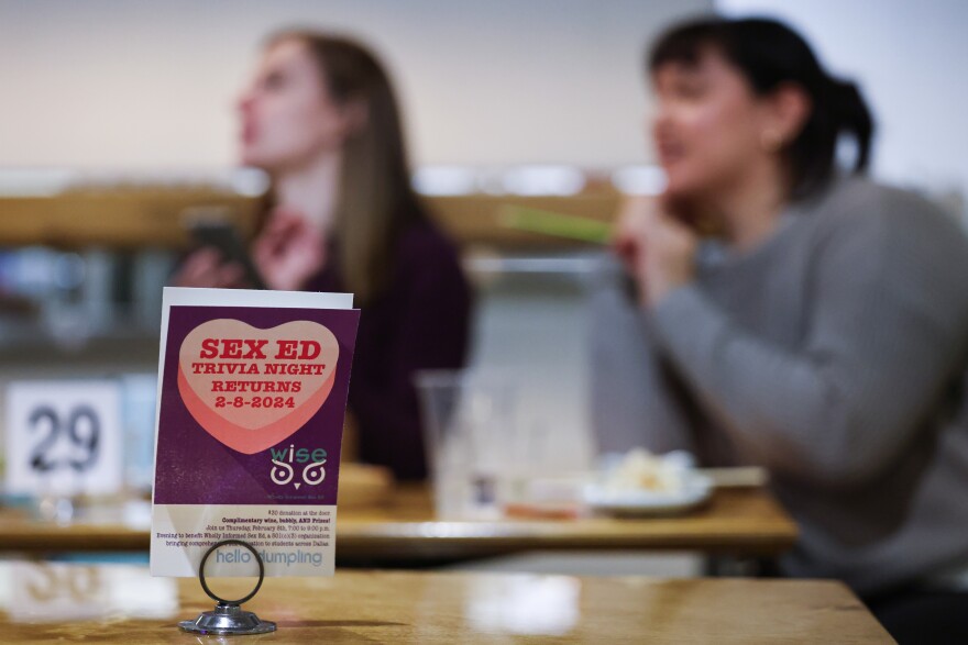 Participants decide on answers during Sex Ed Trivia Night on Thursday, Feb. 8, 2024, at Hello Dumpling in Dallas. The event benefits Wholly Informed Sex Ed, a nonprofit that advocates for comprehensive, medically accurate sex education.
