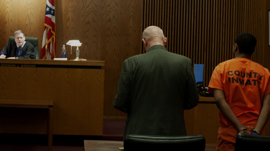 During a Saturday hearing at Cuyahoga County Court of Common Pleas, Administrative Judge Brendan Sheehan speaks to a defendant who plead not guilty to a gun possession charge. [Matthew Richmond / ideastream]