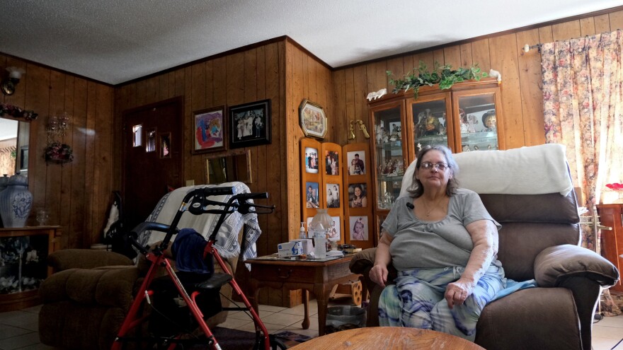 Dorothy Lively sits in the living room of her home in Holly Ridge, Louisiana, on Thursday, October 16, 2025. Lively's home sits at the corner where many of the trucks turn off Highway 80 to enter the Meta construction site. She said she’s never been contacted by Meta or public officials, despite calling law enforcement to complain.