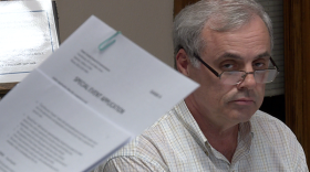 Owen County Commissioners President Jeff Brothers looks on as county attorney Jim Bryan reads the commissioners' revised festival ordinance at their Dec. 16 meeting