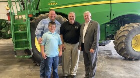 From left to right, Andy Clay and his son Hayden, John Clay, and Gov. Mike Parson. Parson visited the farm in August to congratulate the family for their farm being recognized as a Founding Farm.