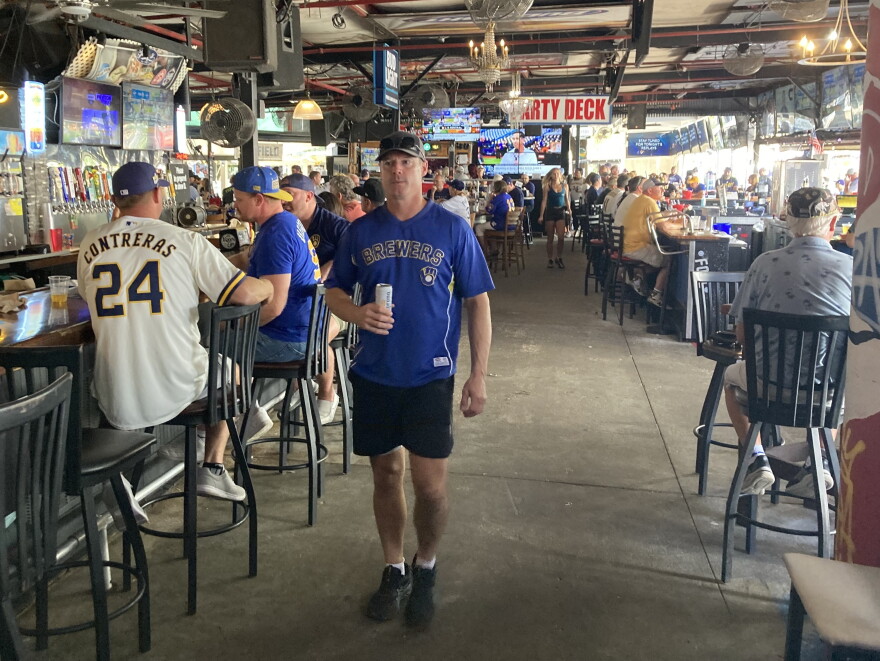 People walking in a bar