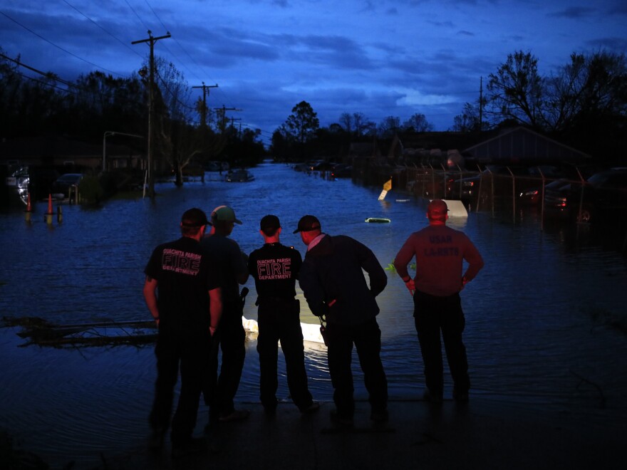 First responders prepare to launch rescue boats to transport residents out of floodwater left behind by Hurricane Ida in LaPlace, Louisiana, U.S., on Monday, Aug. 30, 2021.