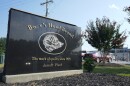 This sign marks the entrance of the Boar's Head processing plant that was tied to a deadly food poisoning outbreak Thursday Aug. 29, 2024, in Jarratt, Va. (