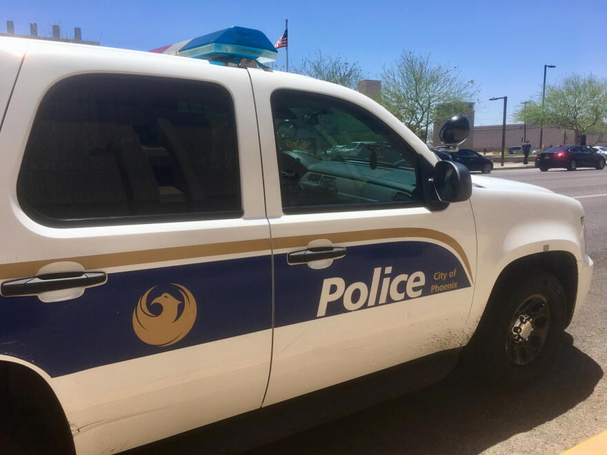 A Phoenix Police Department SUV parked