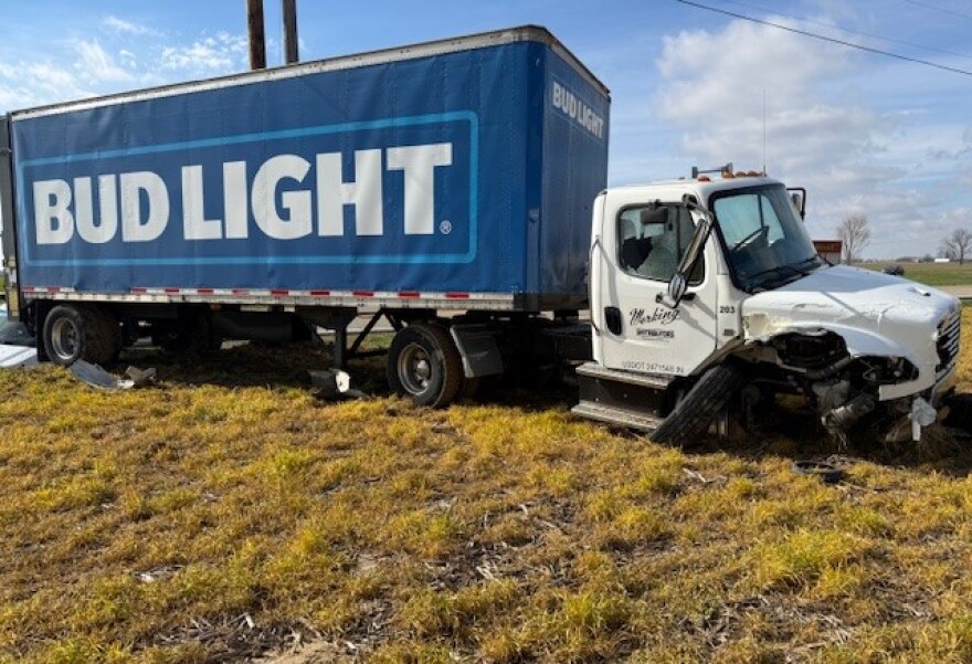 A truck stolen from Working Distributors crashed into a Posey County field after a high-speed chase
