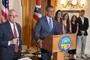Gov. Mike DeWine (right) and Public Safety Director Andy Wilson took questions from reporters as Wilson was introduced as DeWine's appointee as attorney general on May 11, 2026. 