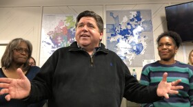 Gov.-elect J.B. Pritzker thanks supporters at the Sangamon County Democratic Party Headquarters on Monday, December 10, 2018. He was flanked by county party chair and Springfield Ald. Doris Turner, left, and Lt. Gov.-elect Juliana Stratton, right.