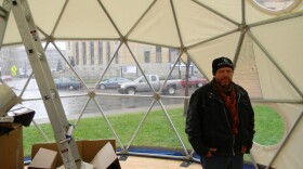 Occupy Buffalo resident John Rossman stands inside the encampment's new geodesic dome. (Click through to see exterior photo.)