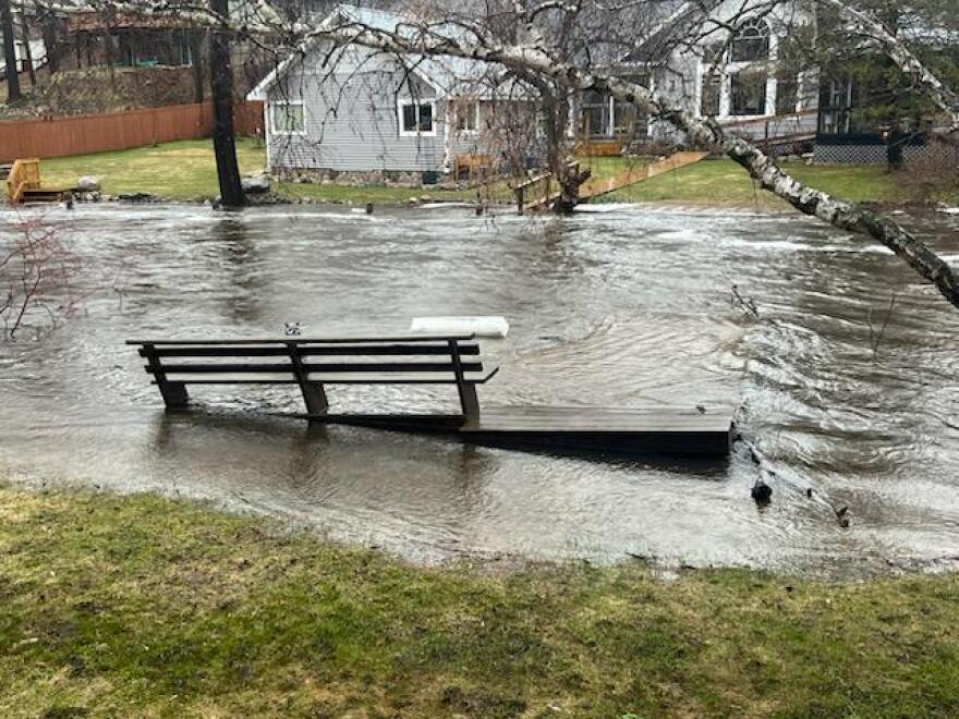 Water rising at homes just downstream of the Bellaire Dam. (Photo : Stacy Maza)