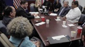 Miami Congresswoman Debbie Mucarsel-Powell (center at head of table) meets with local Venezuelan and Central American community leaders at her offices in Kendall on Tuesday.
