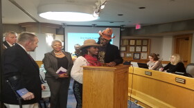 Patti and Bootsy Collins speak about the importance of oral health to overall good health during a Hamilton County commissioners meeting. They began actively promoting good oral health following the death of their nephew to an untreated oral infection.