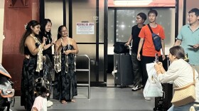 Passengers arriving aboard Hong Kong Airlines' first nonstop flight from Hong Kong to Saipan on July 13, 2026, receive a traditional island welcome from cultural performers at Francisco C. Ada/Saipan International Airport. Additional airlines restarting flights to Saipan include United Airlines from Tokyo Narita on Aug. 2, and Philippine Airlines from Manila in October.