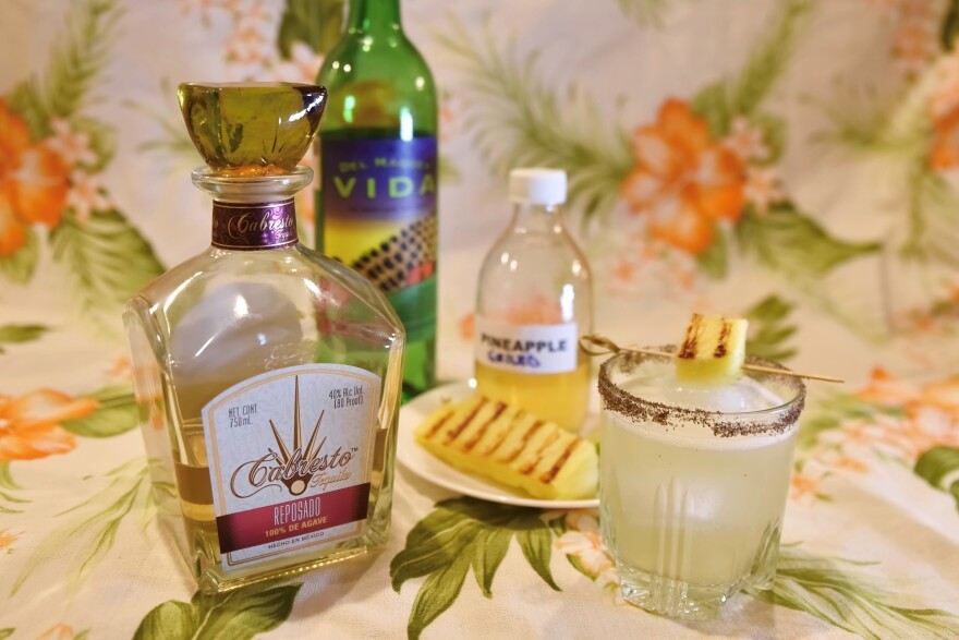 This Grilled Pineapple Margarita gets its smokiness from three different sources.