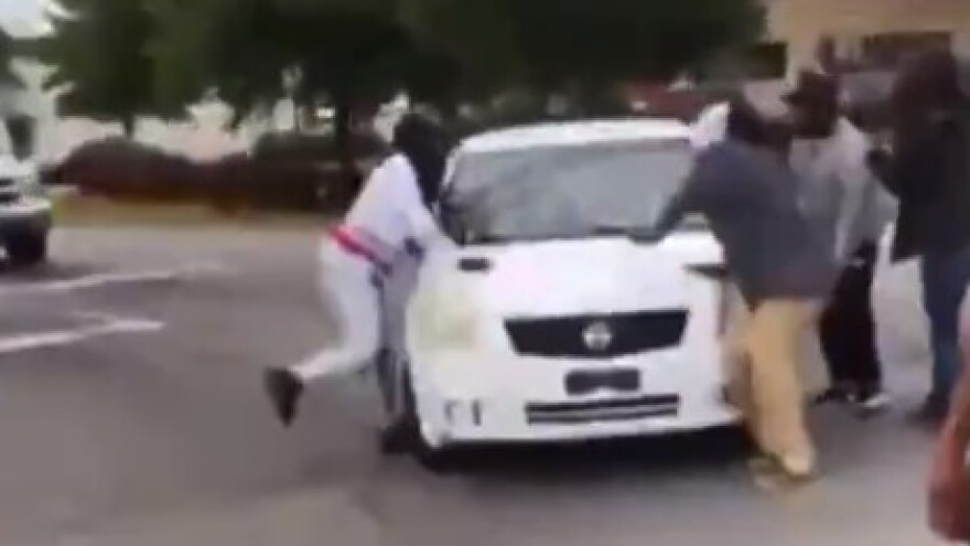 A screengrab from a video from protests Monday shows a car driven by Lisa Michelle O’Quinn just before it is about to strike a protester.