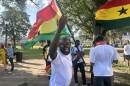 A Ghana fan pumps up others Thursday during a rally for the country's national team ahead of Friday's match against Colombia.