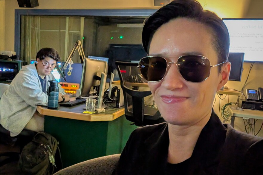 Dyland Reyes (left) and Catherine Shen inside the talk-studio control booth at Connecticut Public.