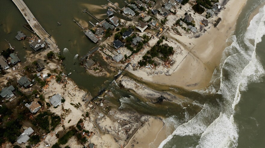 <strong>One Year Ago:</strong> Homes in Mantoloking, N.J., sit in ruin at the end of a bridge that was wrecked by flooding from Superstorm Sandy.