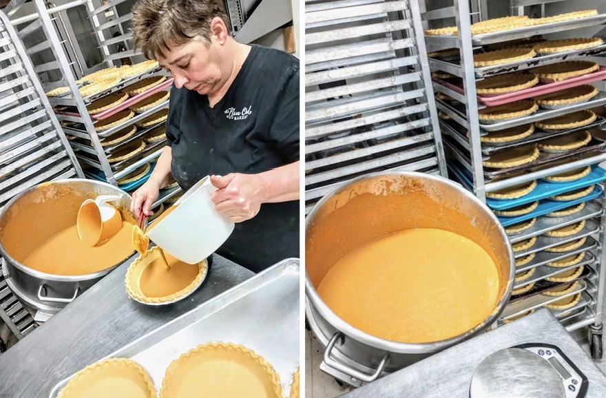 Lead baker Sheila Winford pours pumpkin pie mixture into crusts at The Blue Owl in House Springs, Missouri.