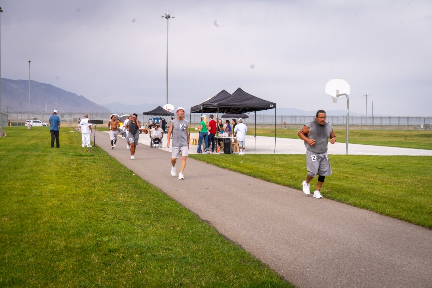 To run 13.1 miles, runners circled a paved track in a lower security exercise yard at the Utah State Correctional Facility 39 times.