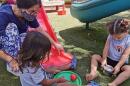 FILE - Early educator observing the activities of two toddlers at the UH Mānoa Children’s Center