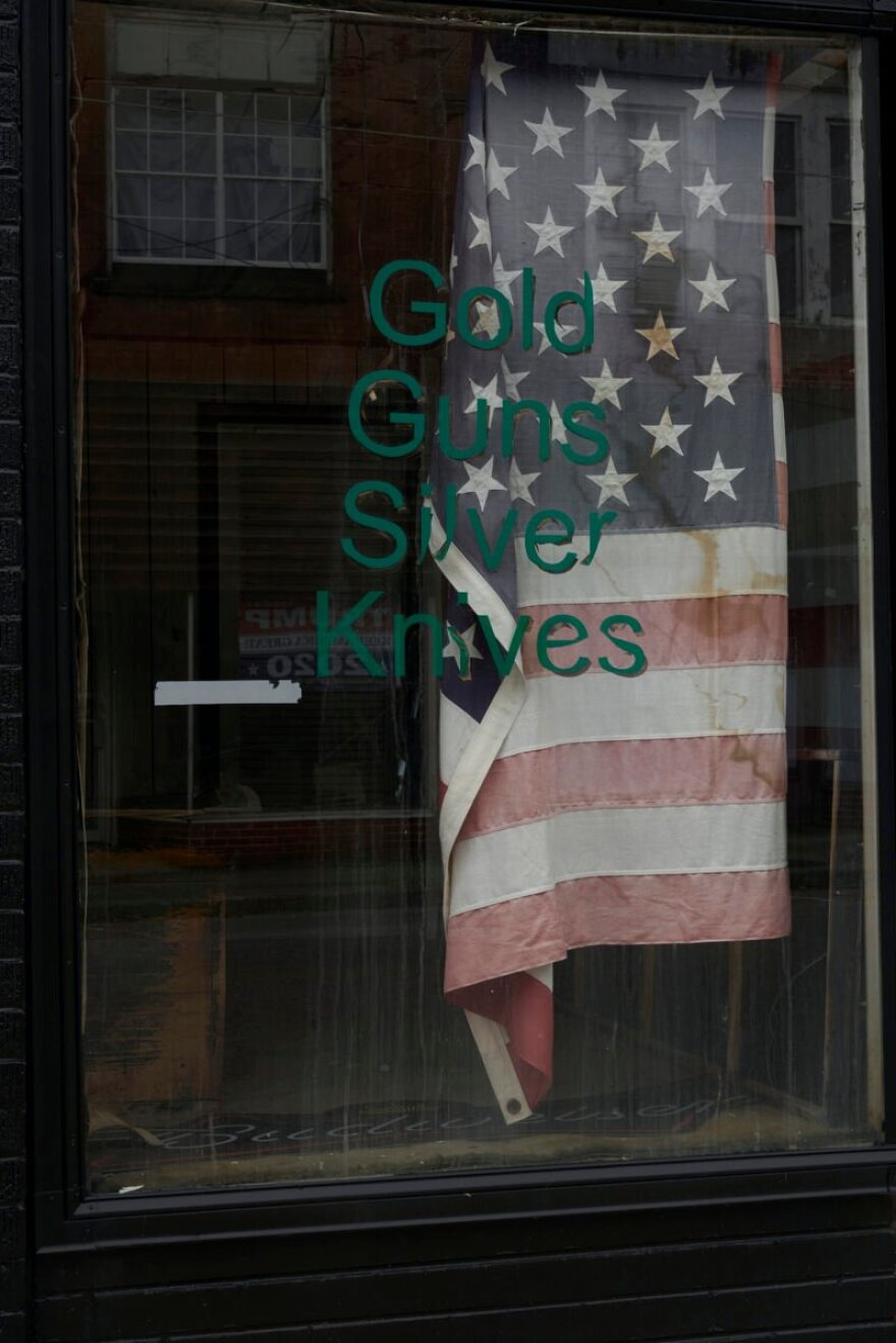 A pawnshop window in downtown Pineville.