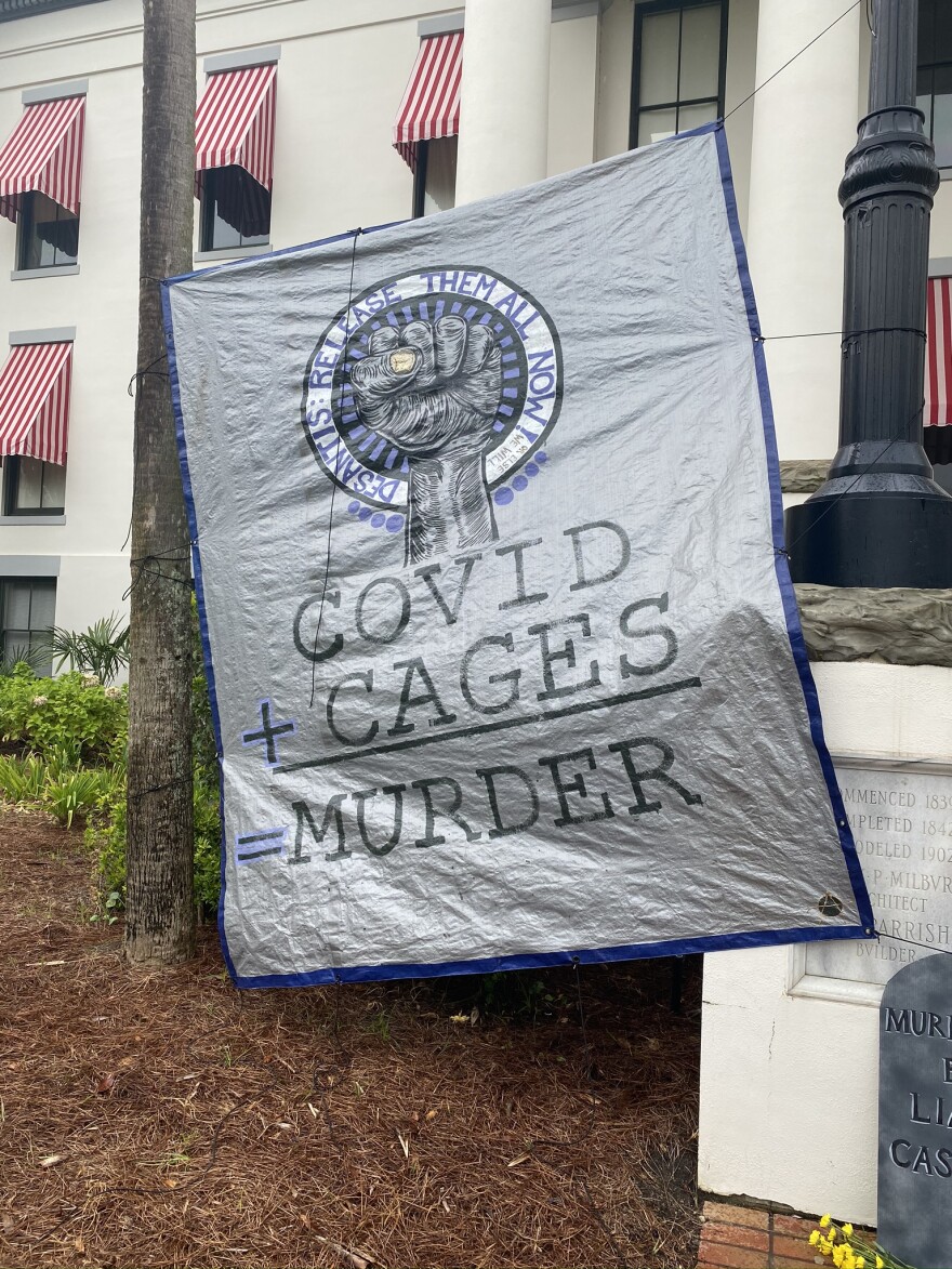 A mock-graveyard on the Historic Capitol grounds created by the Florida Prisoner Solidarity.