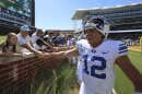 BYU quarterback Jake Retzlaff (12) celebrates with fans after the win over Baylor after an NCAA college football game on Saturday, Sept. 28, 2024, in Waco, Texas.