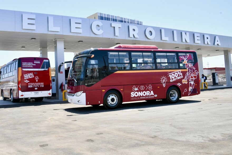 State electric buses charge at Sonora's first public electric vehicle charging station.