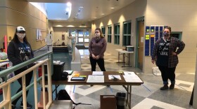 Camp Fire Alaska staff prepare to greet kids and conduct a health screening every morning at a check-in desk in Eagle River. Camp Fire has offered emergency child care for first responders and health-care workers during the coronavirus pandemic. (Photo courtesy Camp Fire Alaska)