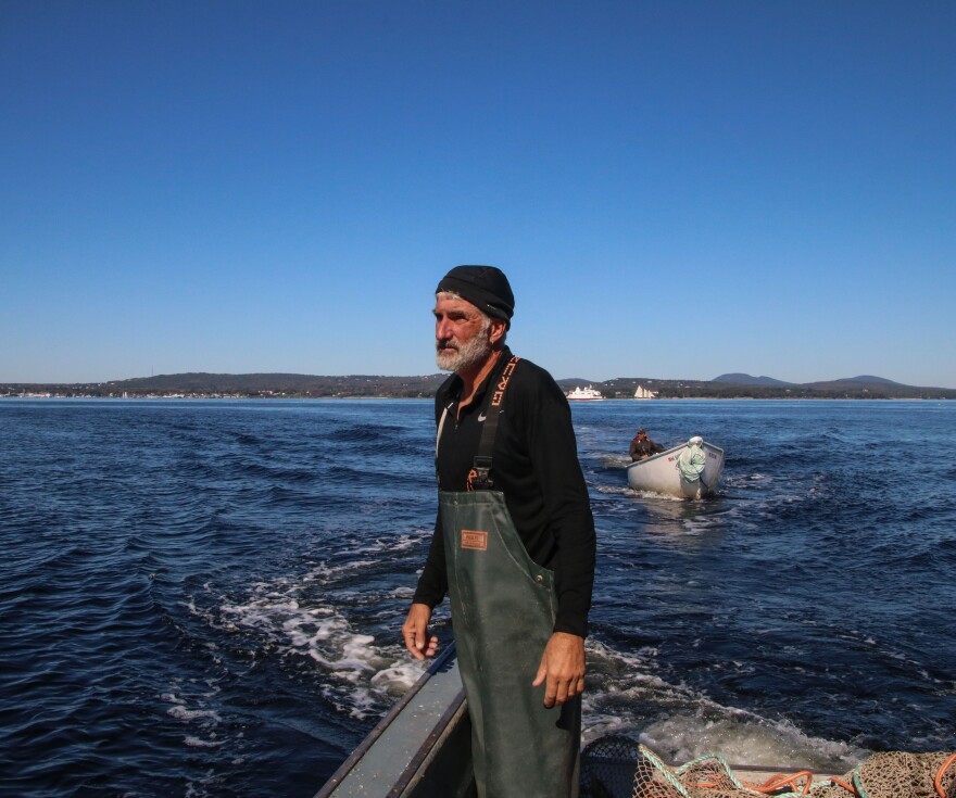 Lobster dealer Jamie Steeves, fishing for menhaden on his boat, the N.C. Wilcox.