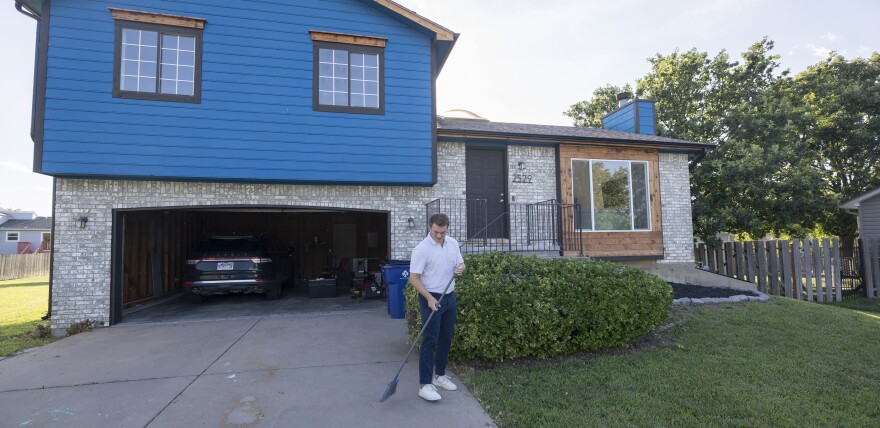 This house's bright blue facade might have discouraged other potential buyers. But it's become the east Wichita home of Alex and Natalie Beauchamp.