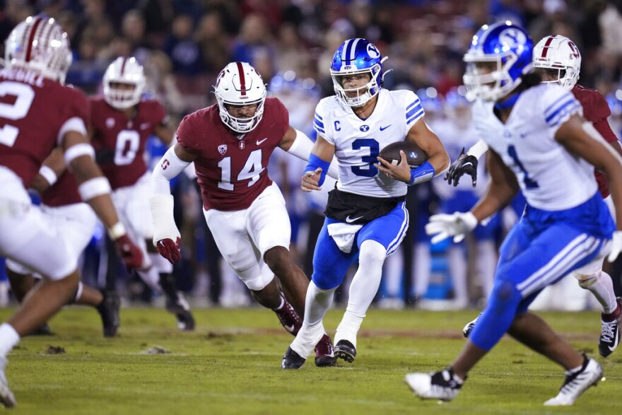 BYU quarterback Jaren Hall (3) runs for a 19-yard touchdown against Stanford during the first half of an NCAA college football game in Stanford, Calif., Saturday, Nov. 26, 2022. (AP Photo/Godofredo A. Vásquez)